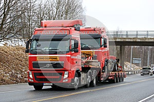 Red Volvo FH Exceptional Transport of Identical Truck