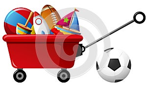 Red wagon with many toys and balls