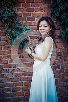 Red Wall, Green Vine, Girl