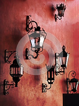 Red wall with lamps