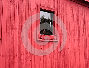 Red wall with window in a Frontier town