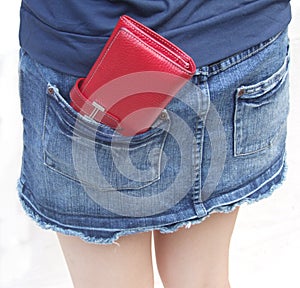 Red wallet in the pocket