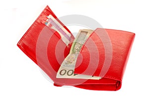 Red wallet with polish money isolated on white