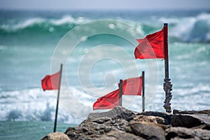 Red warning flag on beach