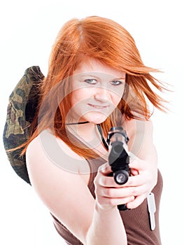 Red warrior girl holding gun over white