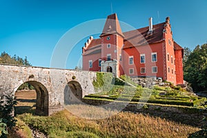 Red water chateau Cervena Lhota in Southern Bohemia, Czech Republic.Summer weather without clouds. Castle without water due to dam