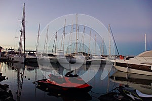 Red water circle with yachts in marina Tribunj, Croatia