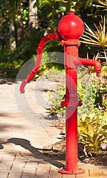 Red water hand pump
