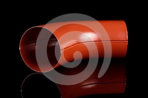 Red water spout element isolated on the black