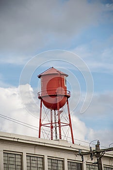 Red water tower in Winston Salem North Carolina