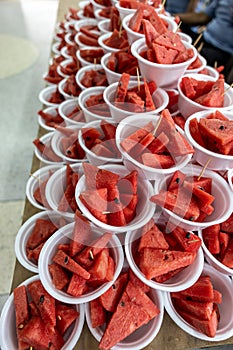 Red watermelon, cut into pieces and inserted with toothpicks