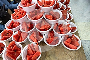 Red watermelon, cut into pieces and inserted with toothpicks