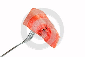 Red watermelon impaled on a fork