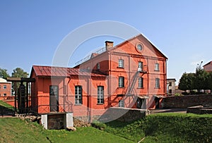 Red watermill building