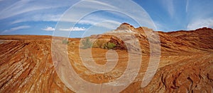 Red wavy sand stones, bluffs and cliifs at Glen Canyon National Recriation Area, Page, Arizona. Panorama