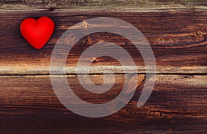 Red Wax Heart On Old Table.