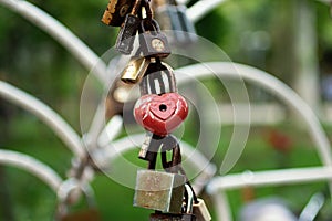 Red wedding heart shaped lock.Group of such types of locks.Symbol of love