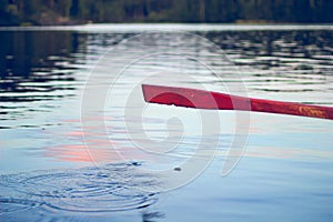 Red wet paddle of a boat
