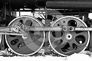 Red wheel and detail of mechanism a vintage russian steam train locomotive