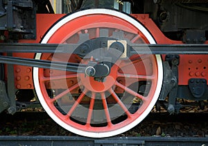 Red wheel of old steam train