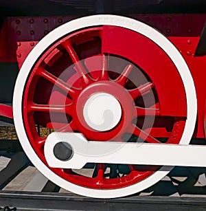 Red wheels of an old railway locomotive