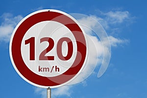 Red and white 120 km speed limit sign