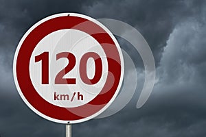 Red and white 120 km speed limit sign