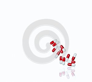 Red, white antibiotic capsules pills isolated on white background with copy space and clipping path.
