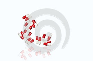 Red, white antibiotic capsules pills isolated on white background with copy space and clipping path.