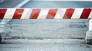 Red and White Barricade on the Side of a Road