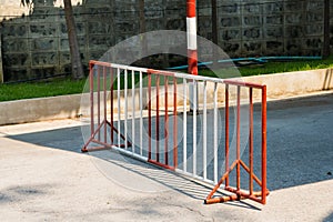 Red and white Baskets of steel barricades in the restricted area