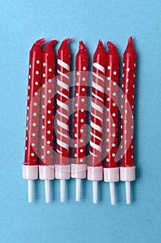 Red and white birthday cake candles