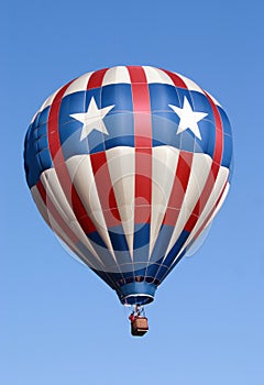 Red , white and blue balloon over a beautiful Florida sky