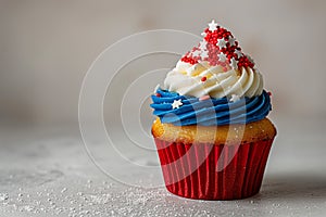 Red, White, and Blue Cupcake Decorated With Sprinkles for a French Holiday photo