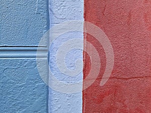 Red, White and Blue painted architectural detail facade of a residential house