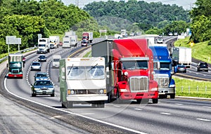 Red, White, and Blue Trucks on the Interstate