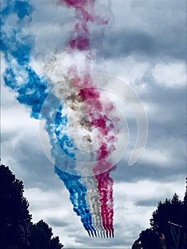 Red, white and blue vapour trail