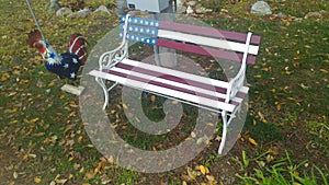 Red white and blye bench and rooster