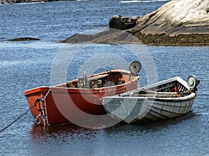 Red and white boats at Peggy`s Cove.