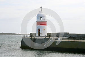 Red and white breakwater light