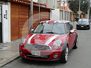 Red and white with british flag Mini Cooper in Lima