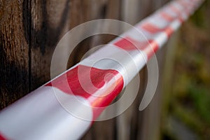 Red and white caution line. Do not cross line tape