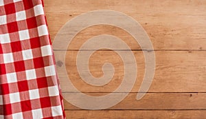 Red and White Checkered Tablecloth on Wooden Background, Copy Space