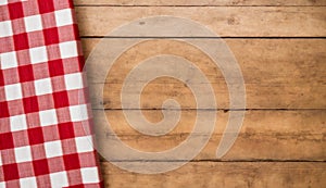 Red and White Checkered Tablecloth on Wooden Background, Copy Space