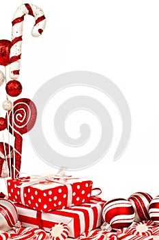 Red and white Christmas border with gifts, baubles and candy