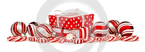 Red and white Christmas border with gifts, baubles and candy photo