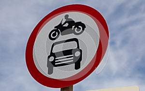 Red and white circular street sign indicating bokes and cars prohibited Leasowe Wirral England June 2019