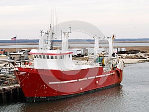 Red & white commercial fishing boat