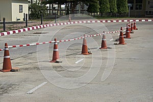 Red and white cones and lines for traffic lane changing