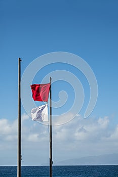 Red and white danger flags